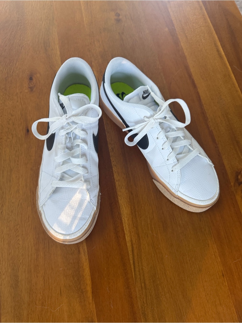 Nike Kids White Sneakers with Black Swoosh and Gum Sole